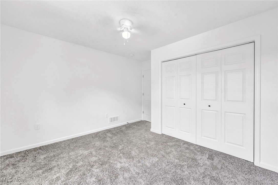 3709 Sudbury Road Cleveland, OH 44120 - Photo 20 of 29 Unfurnished bedroom featuring a closet and carpet floors