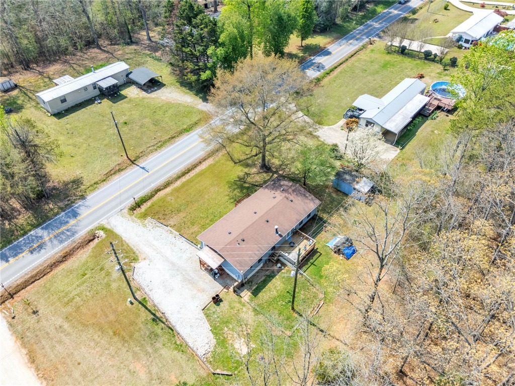 137 East Reedy Fork Road Seneca, SC 29678 - Photo 26 of 28 This expansive aerial view showcases a property with abundant green space and a serene rural setting.