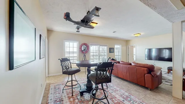 a front view of house with yard and garage