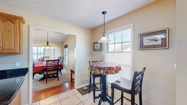 a bedroom with a bed and a flat screen television