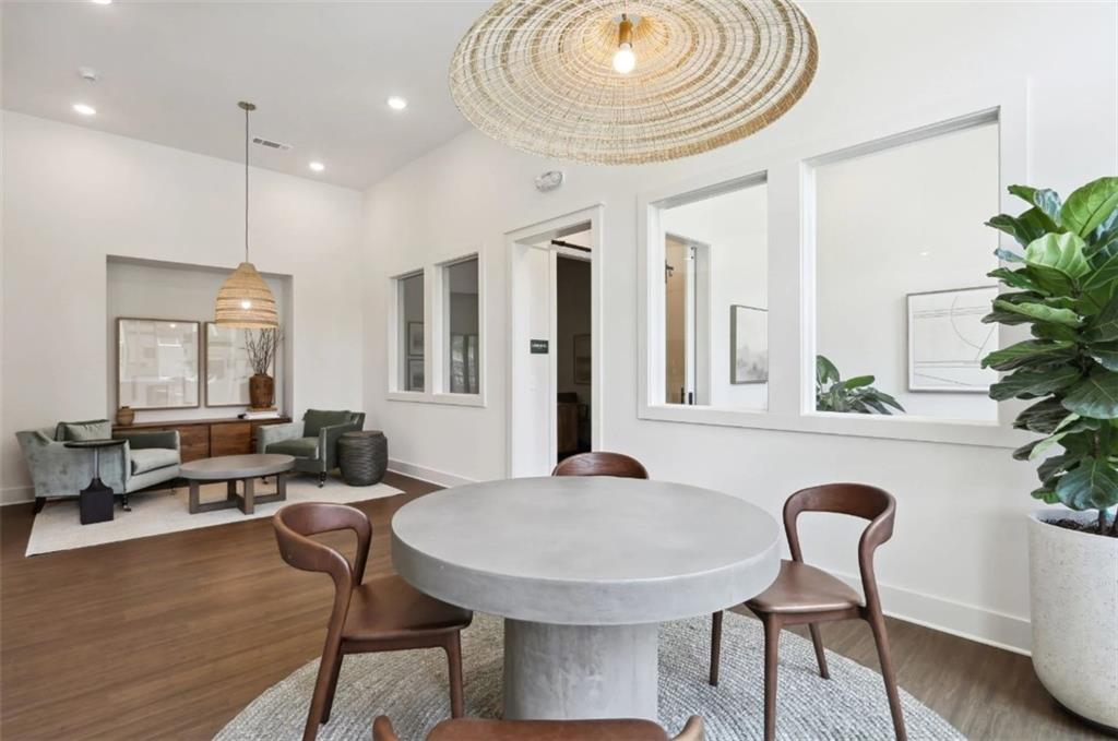 75 Overlook Parkway Southeast, Unit 437 Cartersville, GA 30121 - Photo 18 of 20 a dining room with furniture and wooden floor