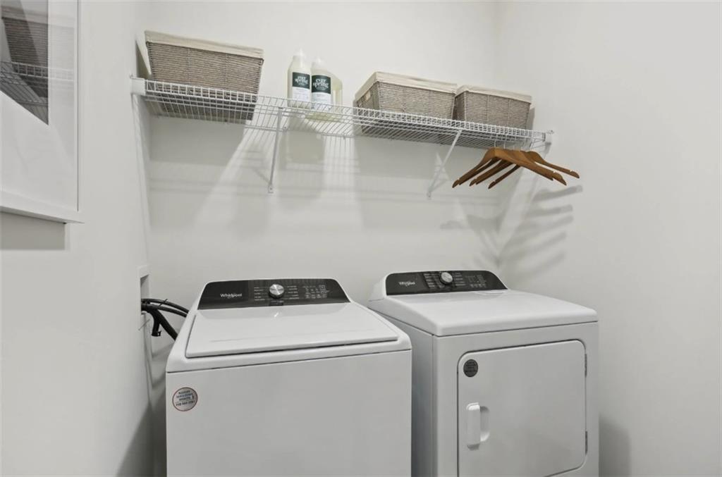 75 Overlook Parkway Southeast, Unit 437 Cartersville, GA 30121 - Photo 9 of 20 a utility room with dryer and washer
