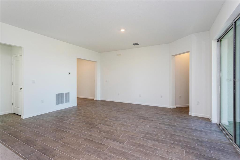 1010 Swamp Chestnut Loop Lady Lake, FL 32159 - Photo 4 of 22 a view of an empty room