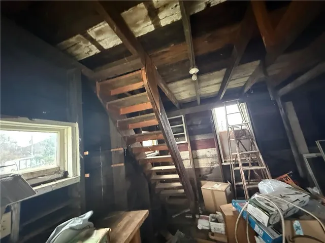 a view of livingroom with furniture and windows