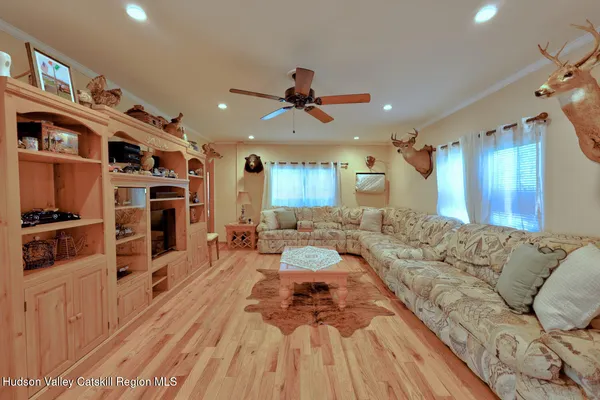 a bedroom with a bed and a fireplace