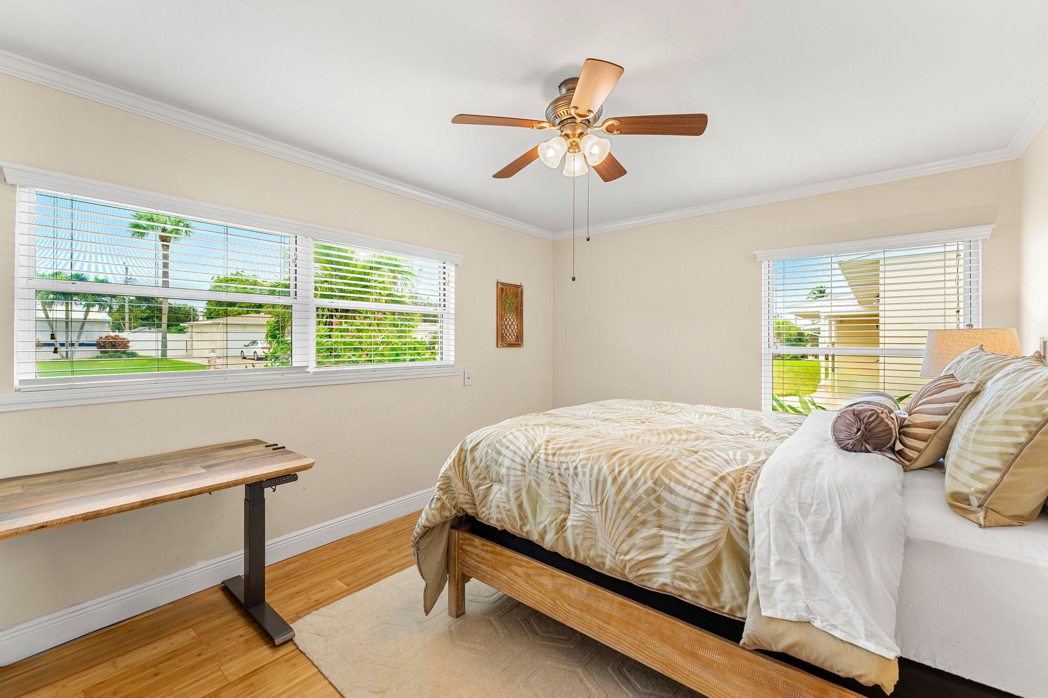 428 Dempsey Drive Cocoa Beach, FL 32931 - Photo 14 of 25 a bedroom with a bed and a table