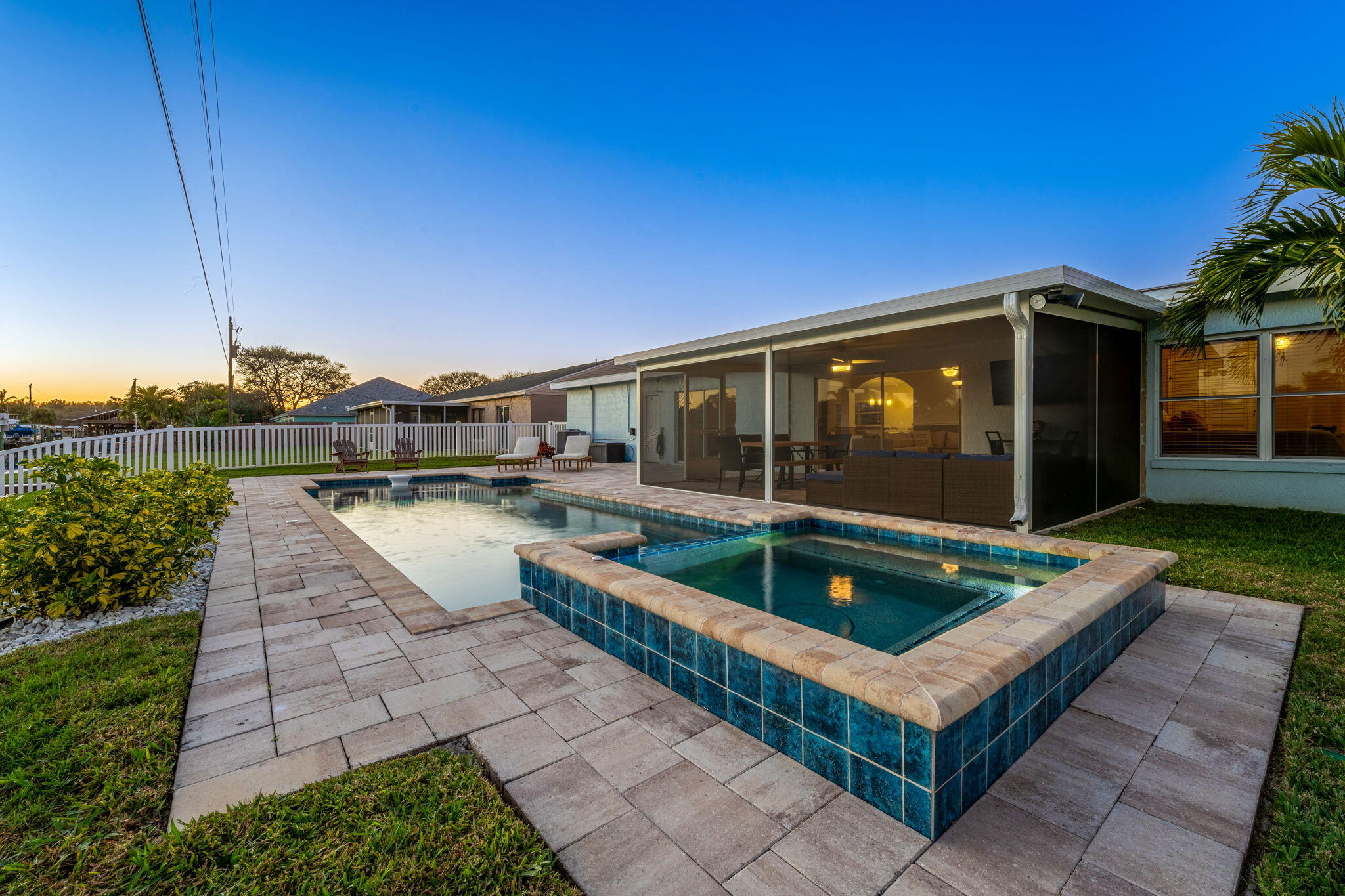 428 Dempsey Drive Cocoa Beach, FL 32931 - Photo 16 of 25 a view of house with swimming pool outdoor seating