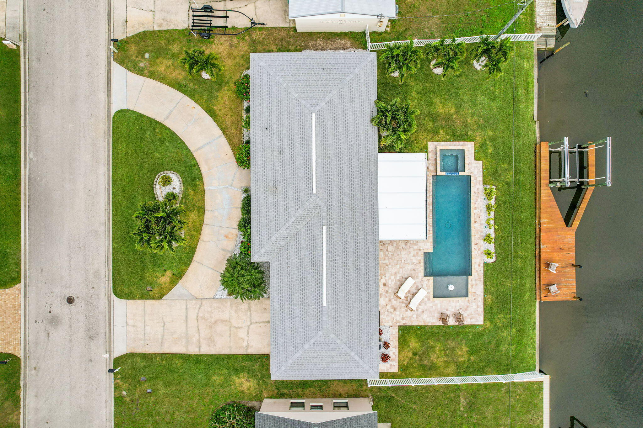 428 Dempsey Drive Cocoa Beach, FL 32931 - Photo 24 of 25 an aerial view of a house with a swimming pool