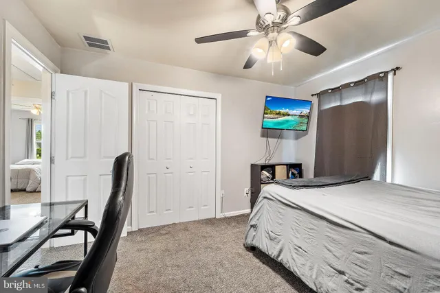 a view of hallway with livingroom