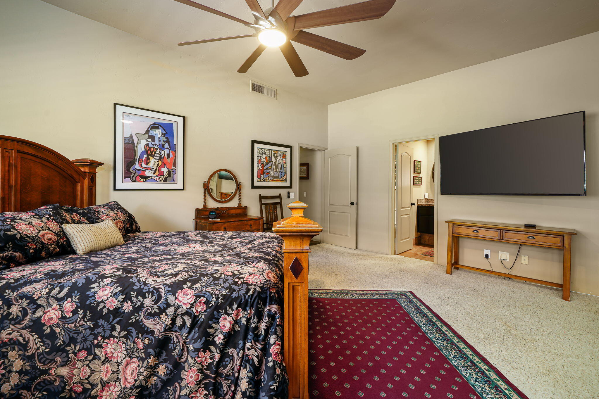 55 Colonial Drive Rancho Mirage, CA 92270 - Photo 23 of 31 a bedroom with bed and a flat screen tv