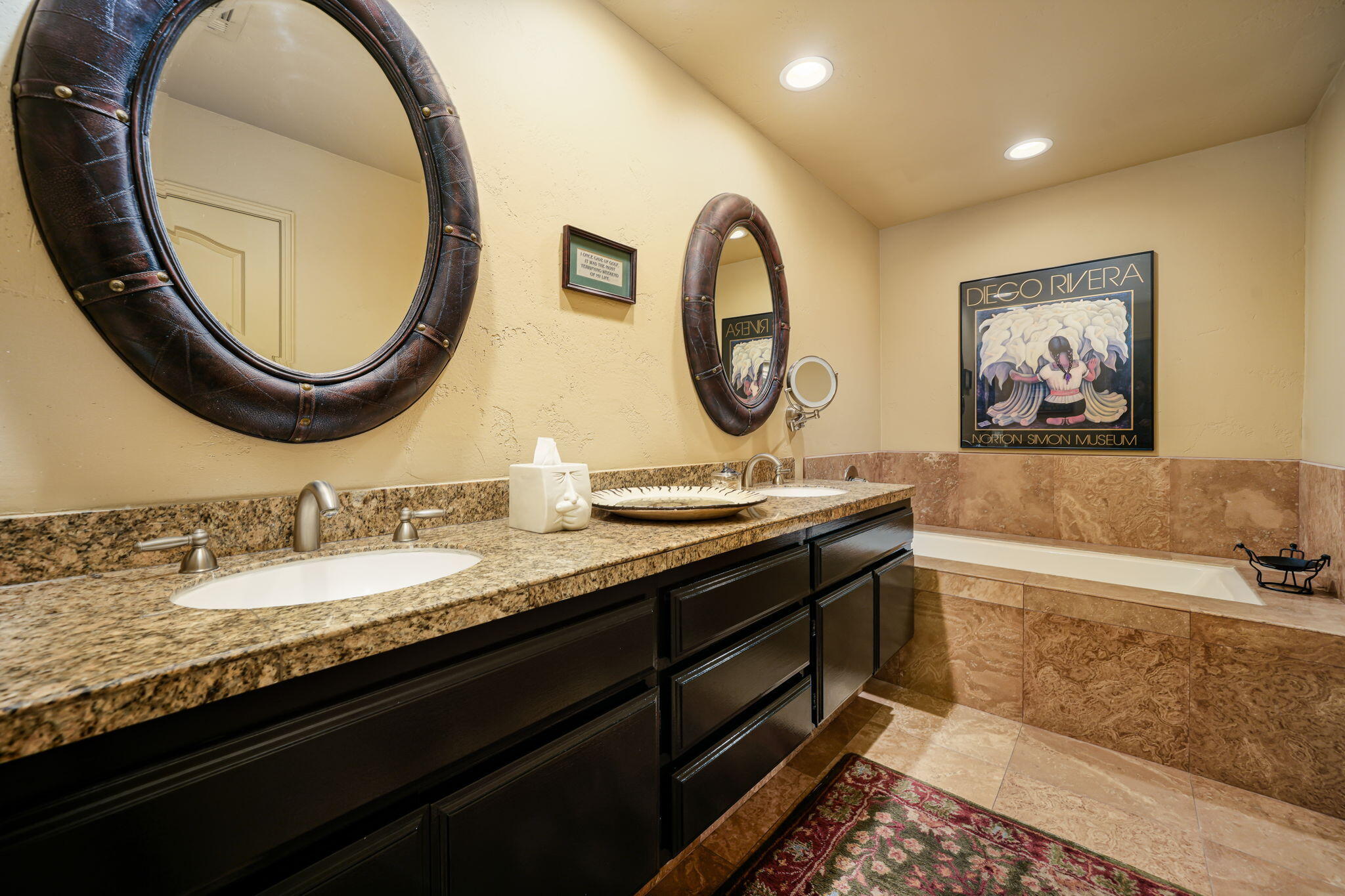 55 Colonial Drive Rancho Mirage, CA 92270 - Photo 24 of 31 a bathroom with a granite countertop sink and a mirror