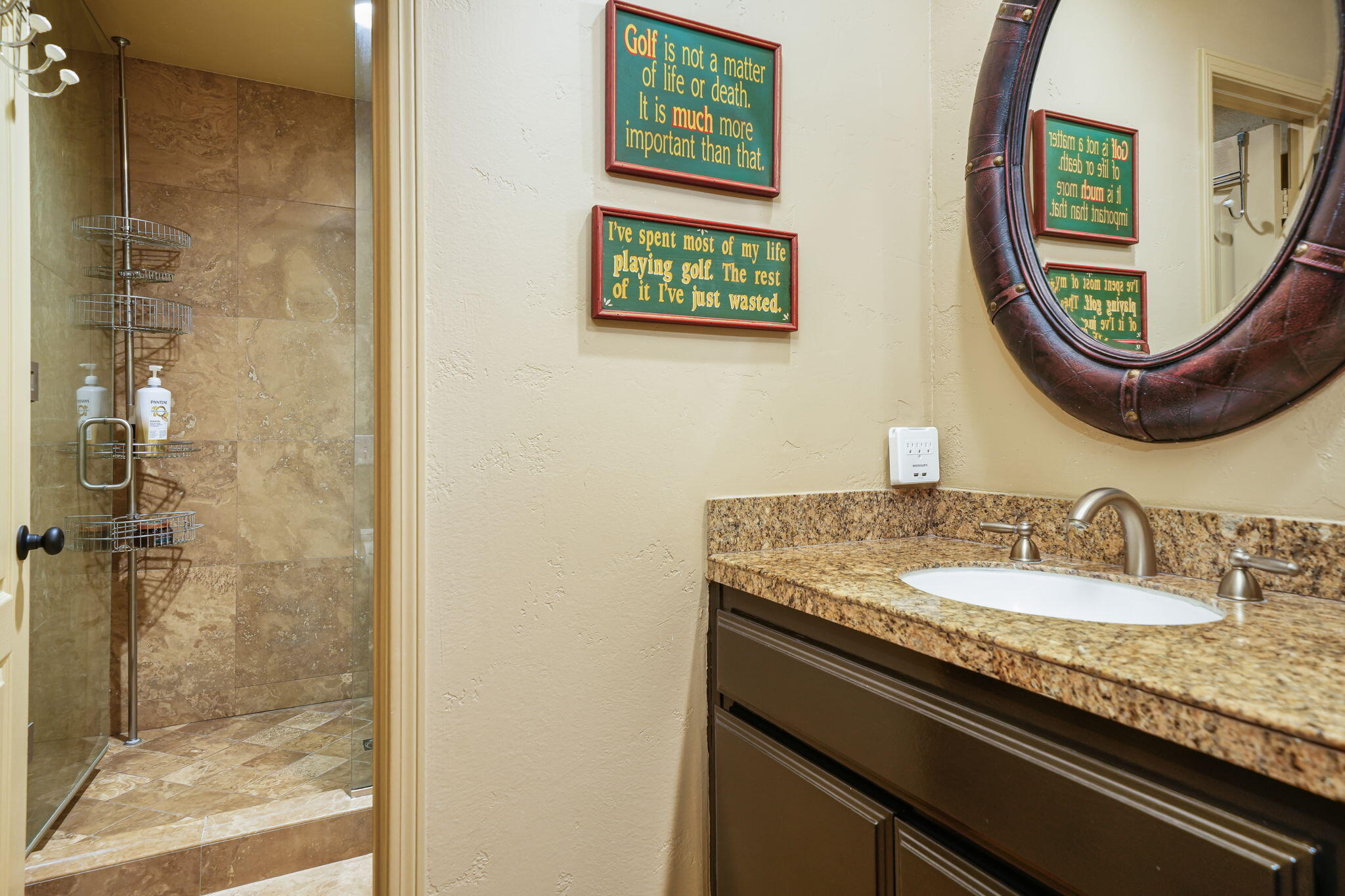 55 Colonial Drive Rancho Mirage, CA 92270 - Photo 25 of 31 a bathroom with a granite countertop toilet sink and a mirror
