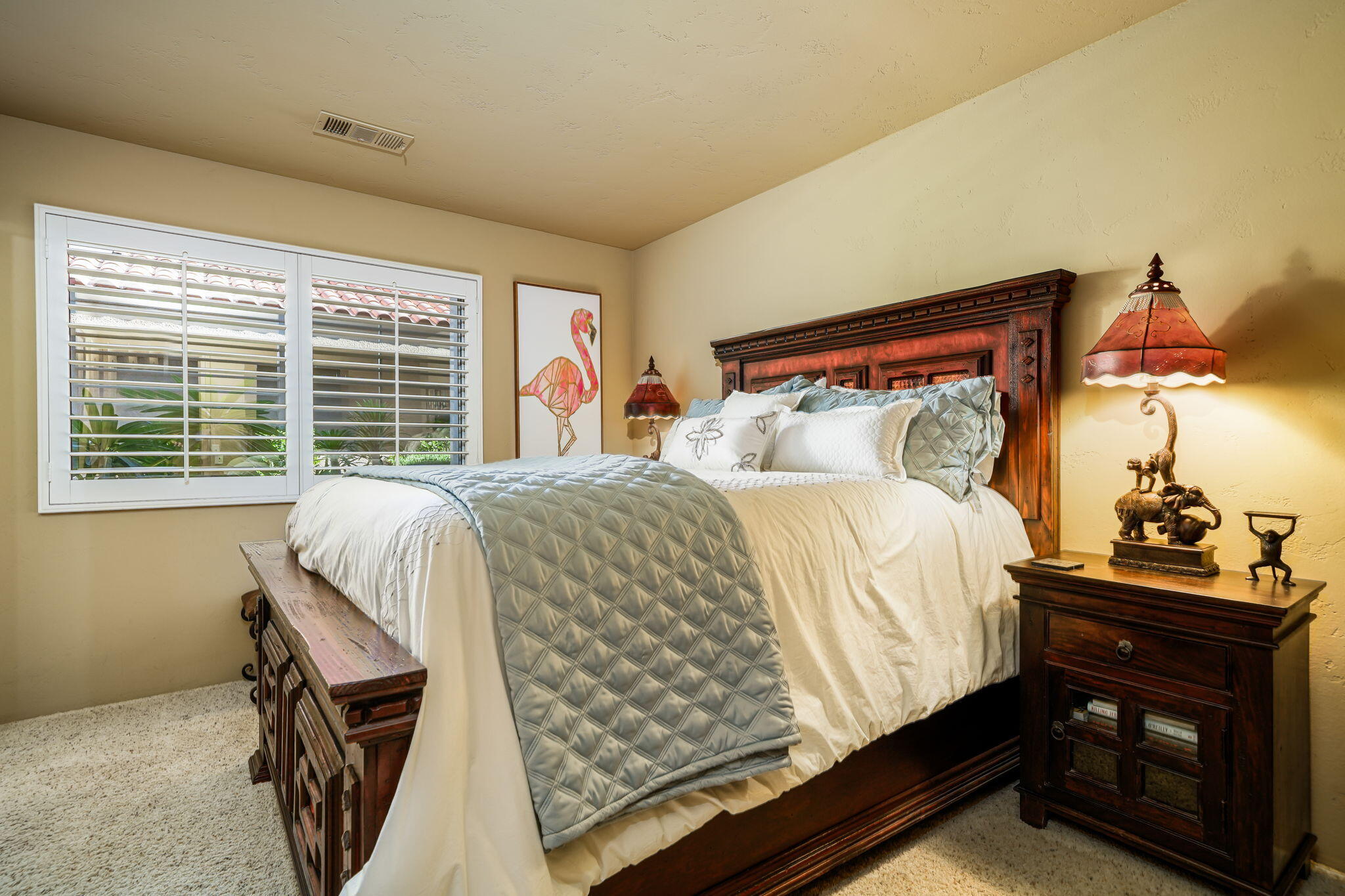 55 Colonial Drive Rancho Mirage, CA 92270 - Photo 28 of 31 a bed sitting in a bedroom next to a window
