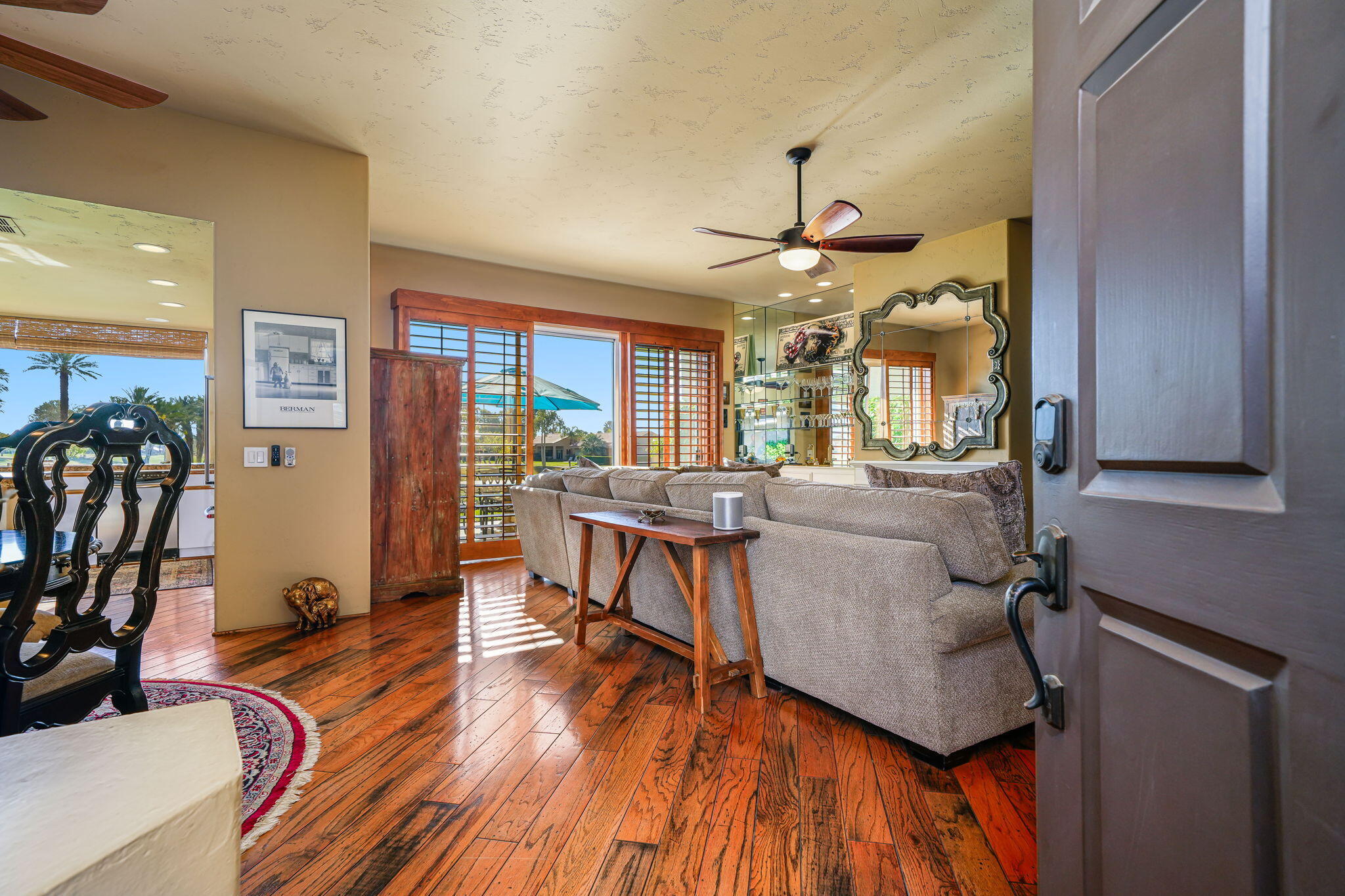 55 Colonial Drive Rancho Mirage, CA 92270 - Photo 7 of 31 a view of a dining room with furniture window and wooden floor