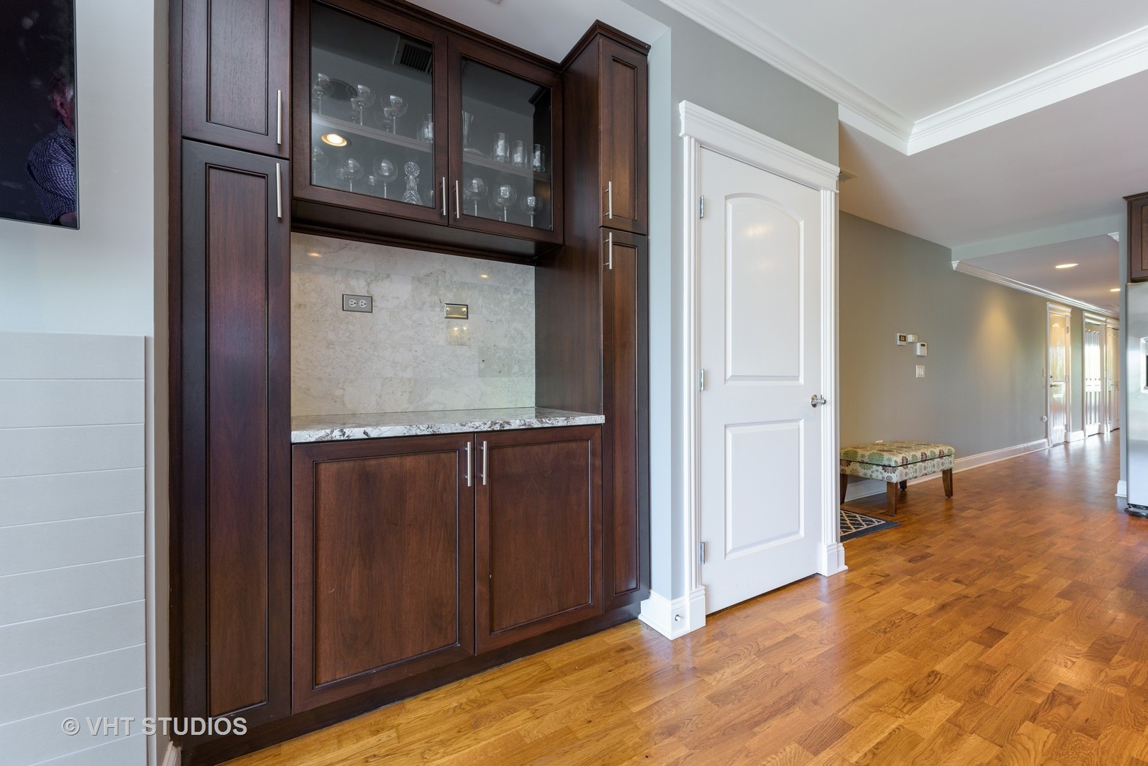 1909 West Diversey Parkway, Unit 302 Chicago, IL 60614 - Photo 11 of 12 a view of a hallway with wooden floor