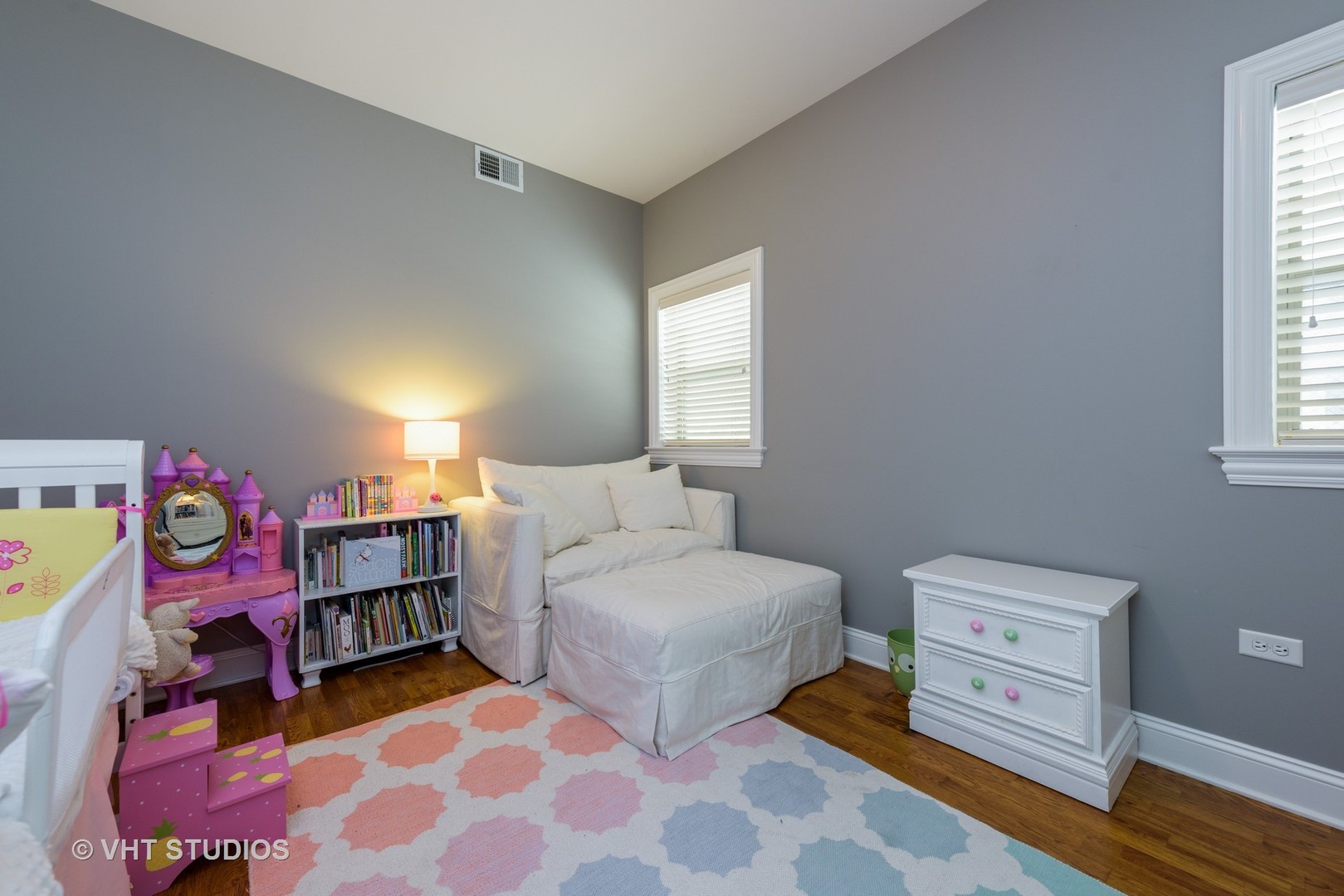 1909 West Diversey Parkway, Unit 302 Chicago, IL 60614 - Photo 8 of 12 a bedroom with a bed and a dresser in it