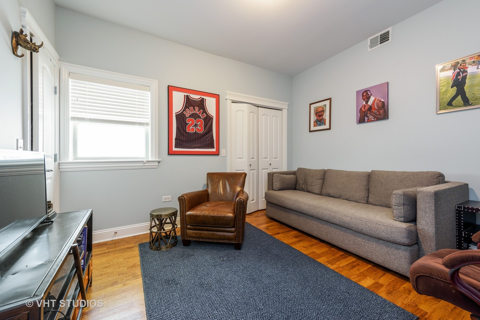 1909 West Diversey Parkway, Unit 302 Chicago, IL 60614 - Photo 9 of 12 a living room with furniture and a window