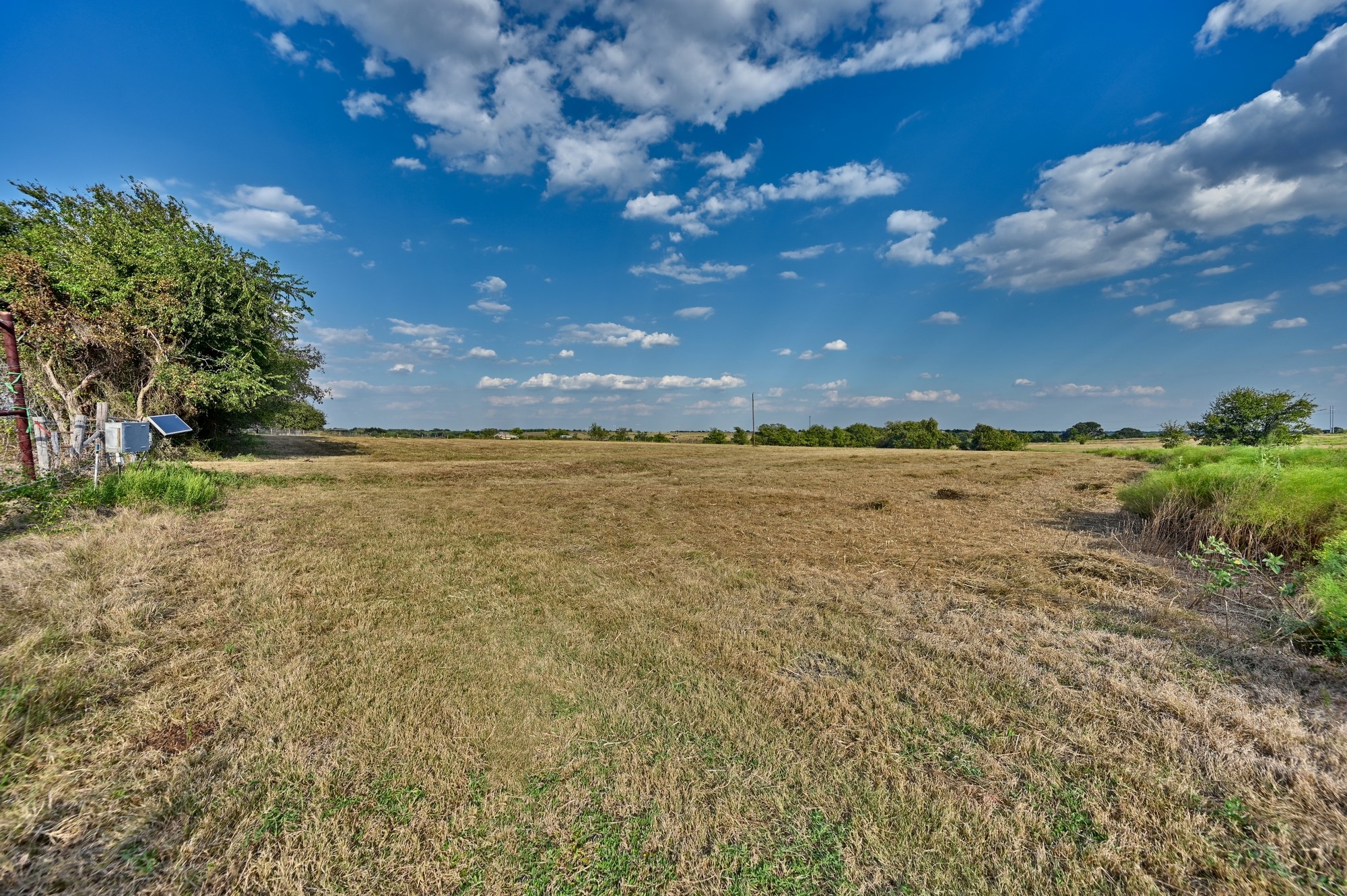 86-acres Ganske Road Burton, TX 77835 - Photo 18 of 24 a view of a big yard with an outdoor space