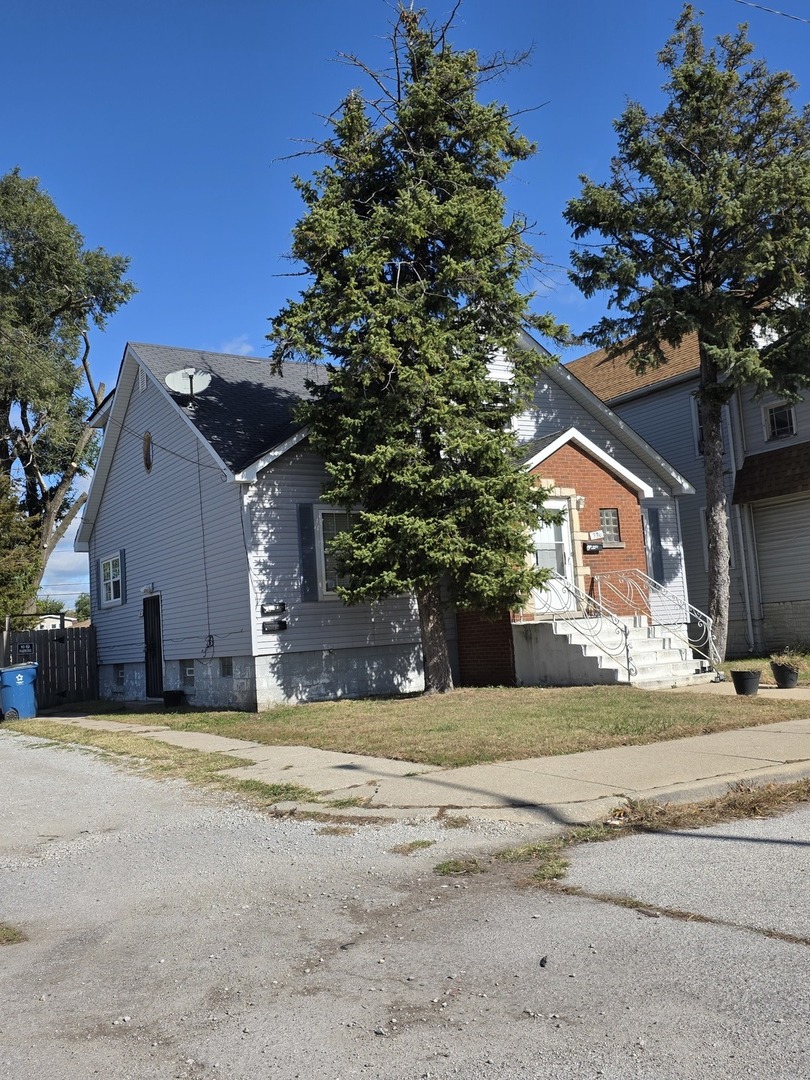 336 153rd Place Calumet City, IL 60409 - Photo 2 of 2 a view of a house with a yard
