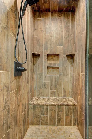 a bathroom with a toilet a sink and bathtub