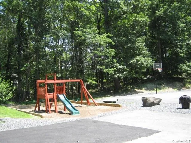 a view of swimming pool from a lounge chair