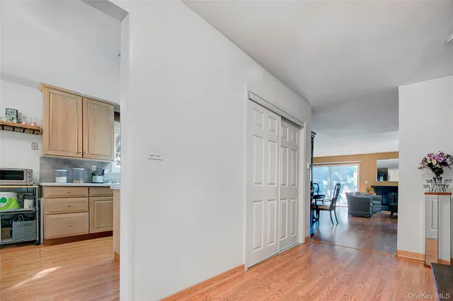 a view of a kitchen with a window and appliances