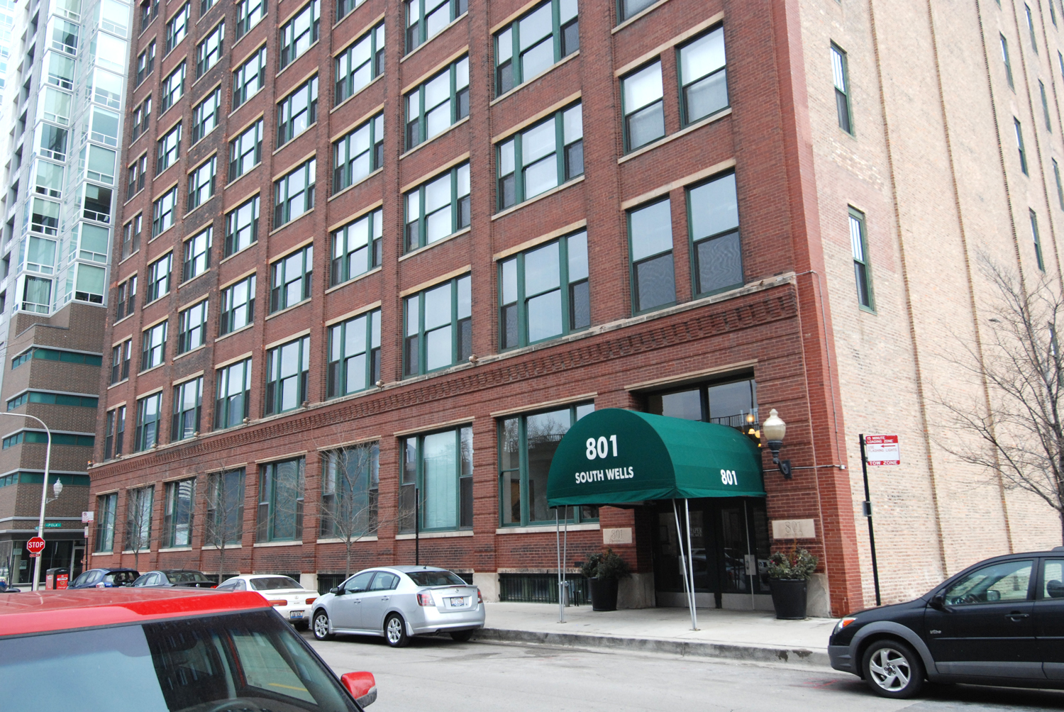 a front view of a building with street view