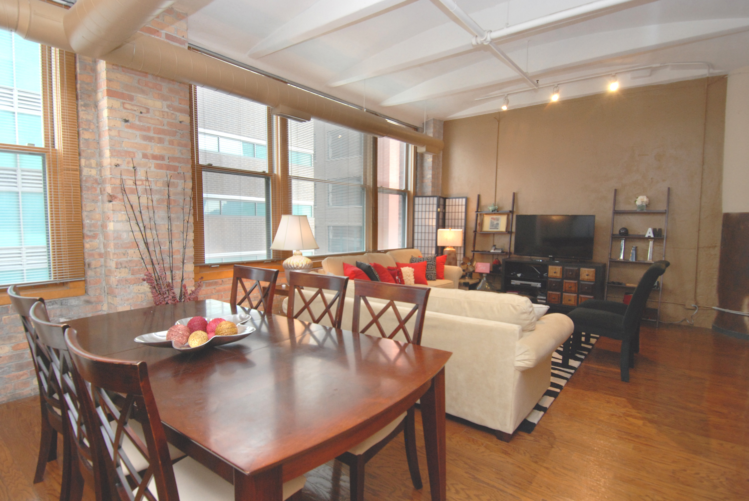 801 South Wells Street, Unit 311 Chicago, IL 60607 - Photo 4 of 16 a view of a dining room with furniture window and outside view