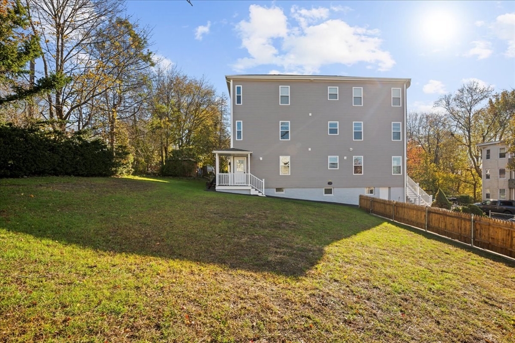9 Upsala Street, Unit 2 Worcester, MA 01610 - Photo 16 of 29 a view of a house with a yard