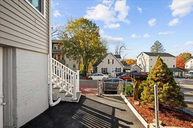 a view of a balcony with chairs