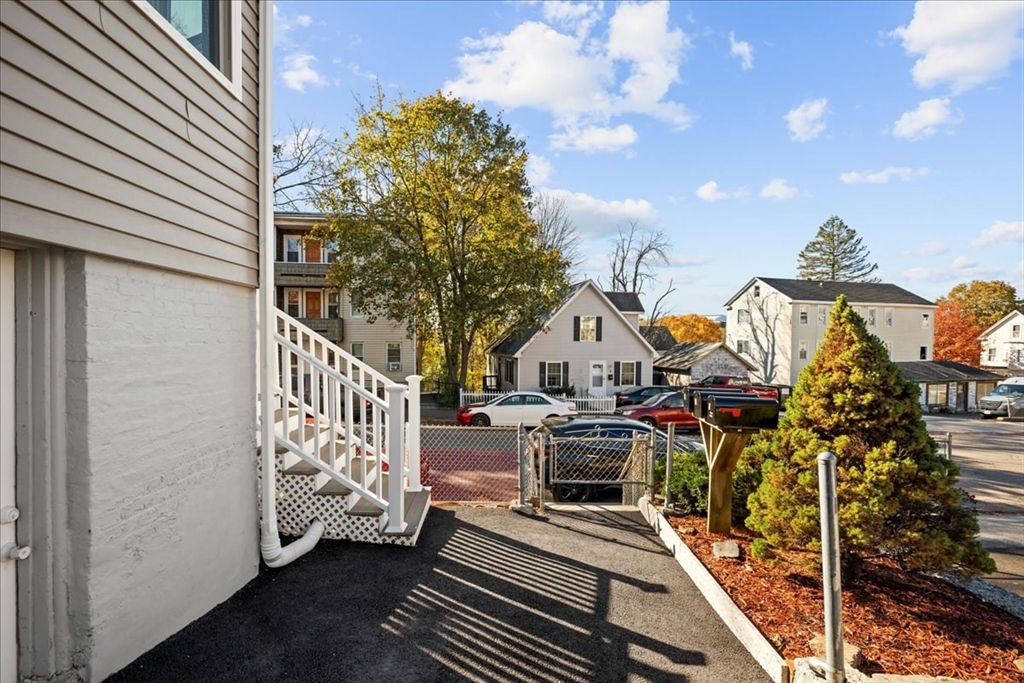 9 Upsala Street, Unit 2 Worcester, MA 01610 - Photo 21 of 29 a view of a balcony with chairs