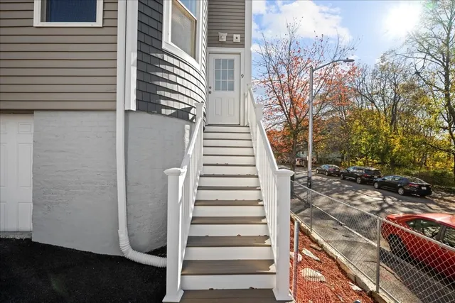 a view of entryway with a front door