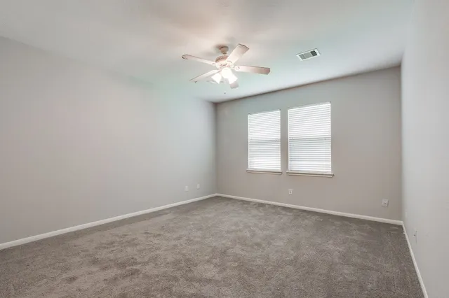 a bathroom with a sink double vanity and a mirror