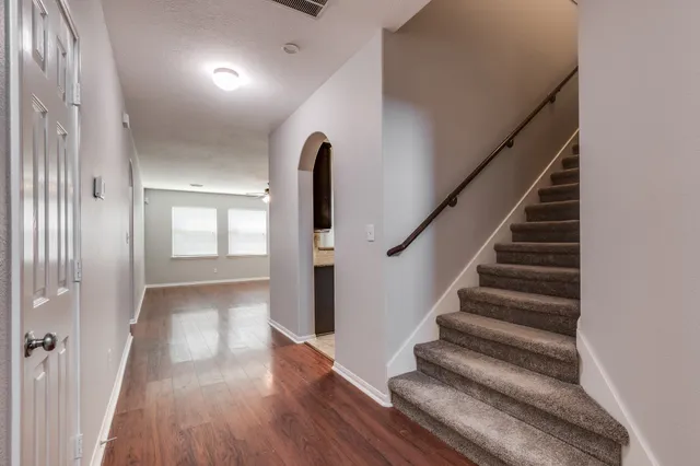 a view of entryway with wooden floor