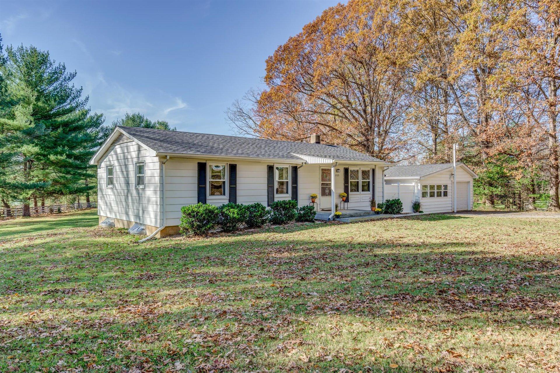 2725 Morgans Mill Road Goodview, VA 24095 - Photo 2 of 49 a front view of a house with a yard