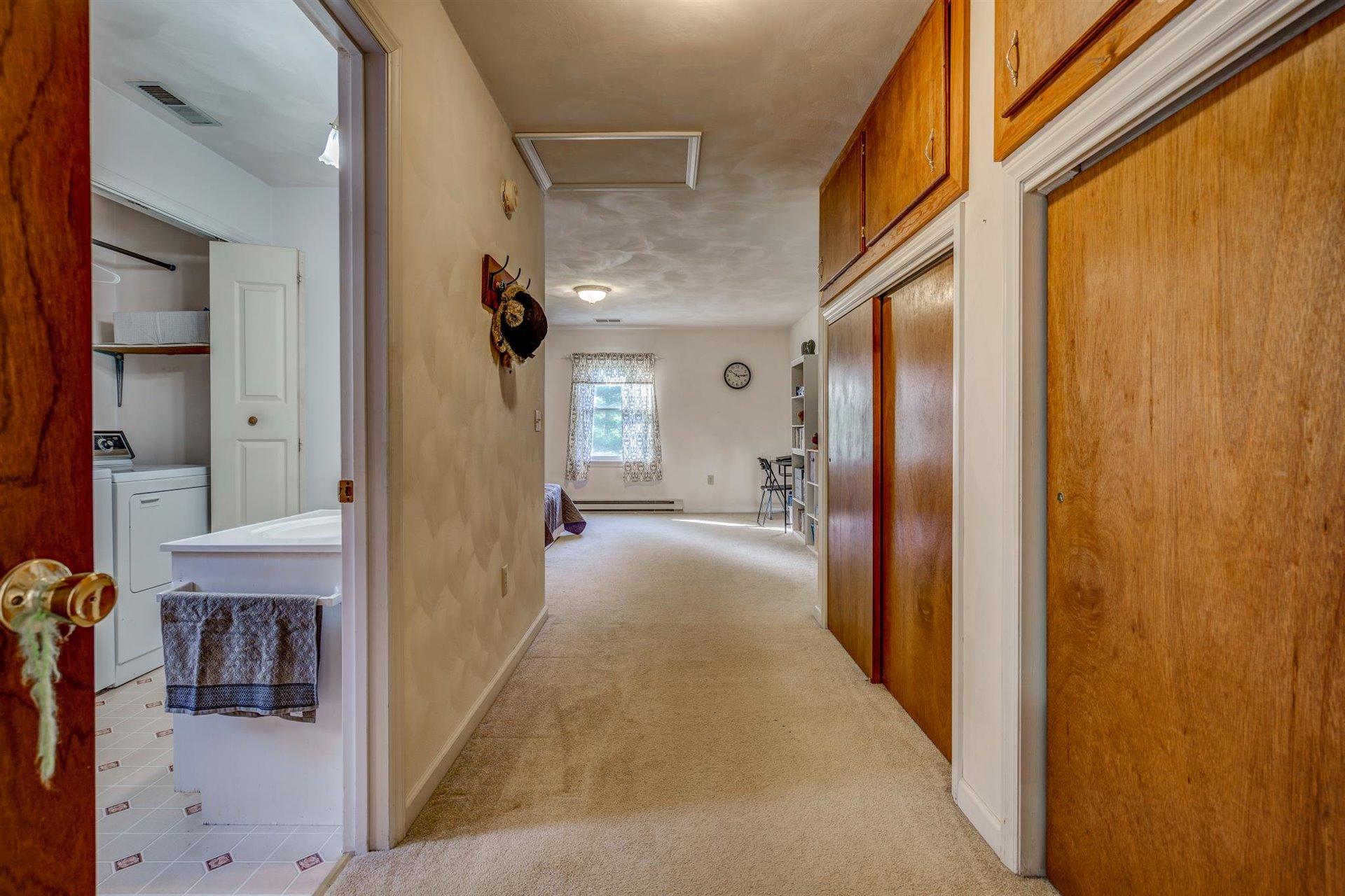 2725 Morgans Mill Road Goodview, VA 24095 - Photo 12 of 49 a view of hallway with furniture and a livingroom