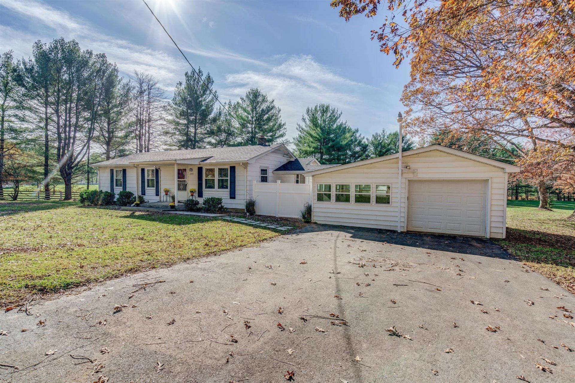 2725 Morgans Mill Road Goodview, VA 24095 - Photo 3 of 49 a front view of a house with a yard