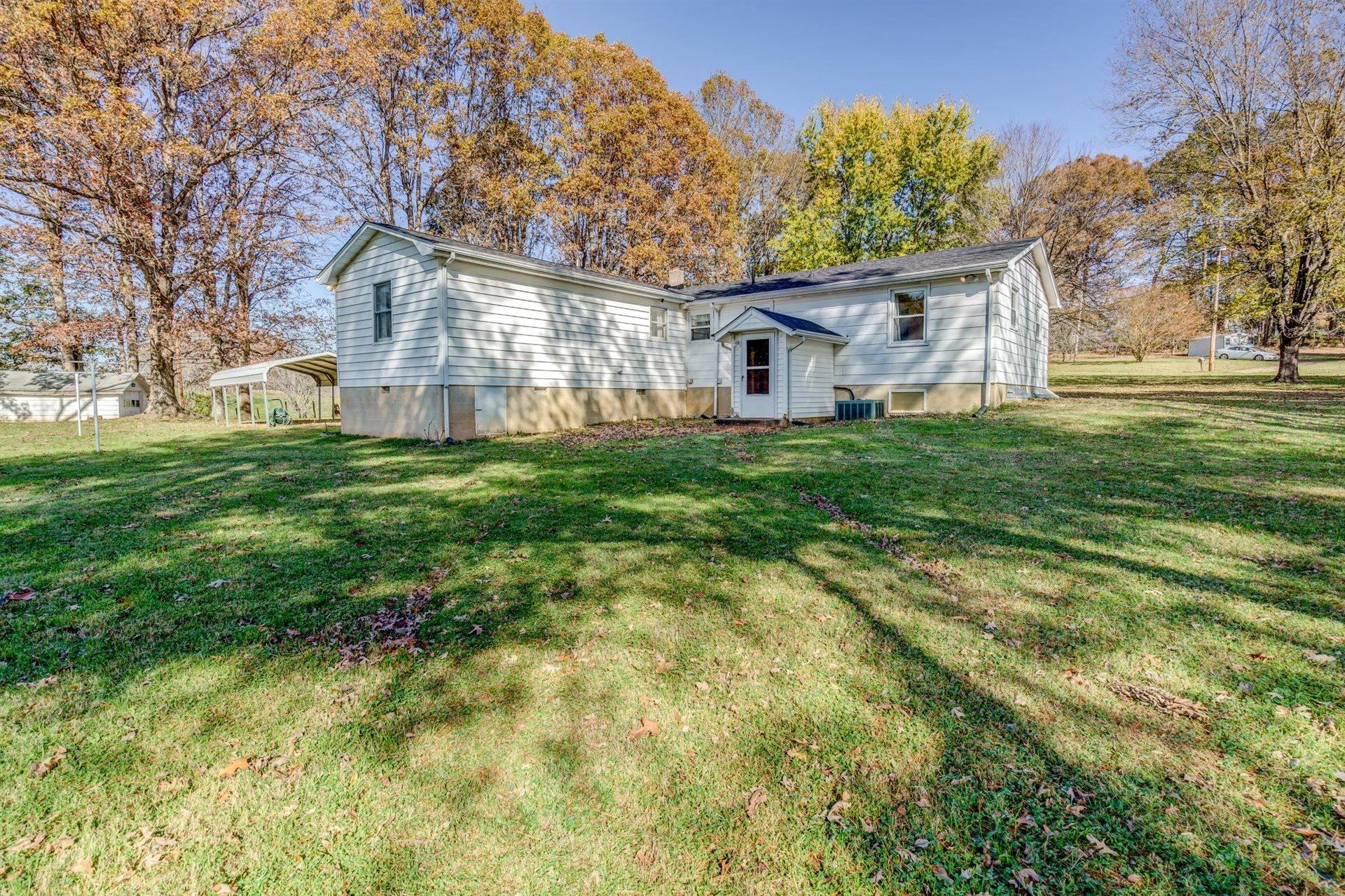 2725 Morgans Mill Road Goodview, VA 24095 - Photo 37 of 49 a view of a yard in front of house