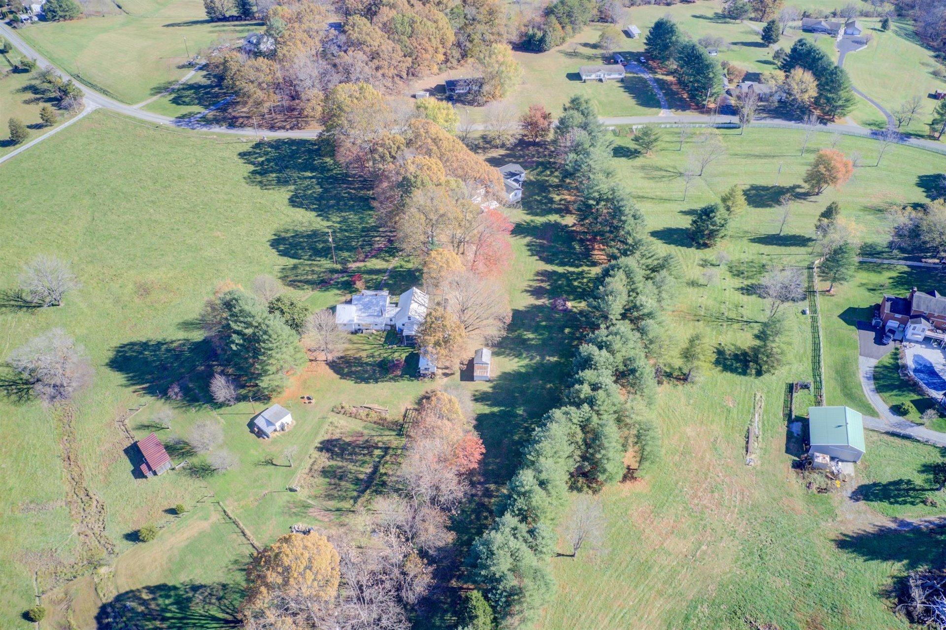 2725 Morgans Mill Road Goodview, VA 24095 - Photo 45 of 49 an aerial view of residential houses with outdoor space