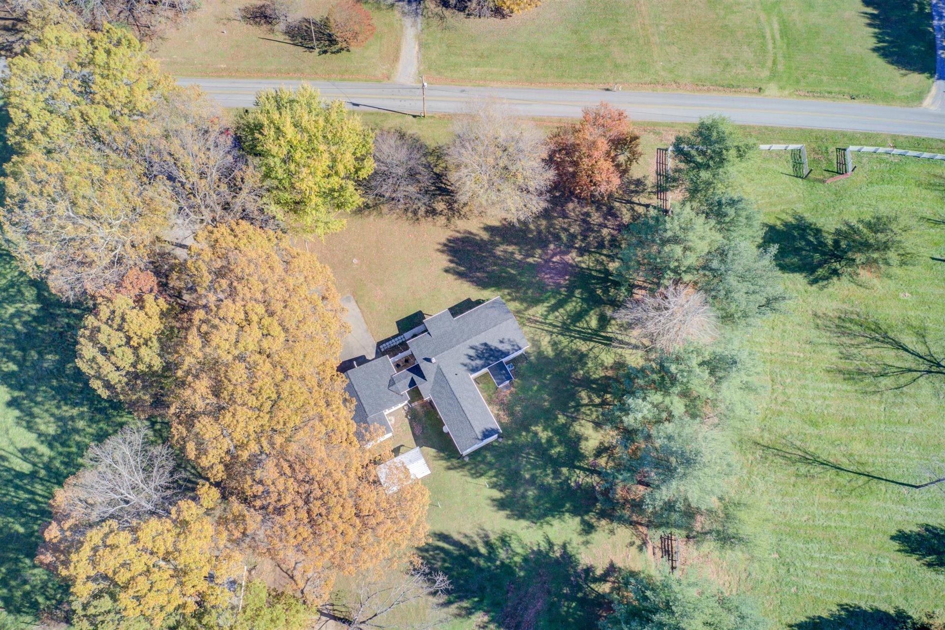 2725 Morgans Mill Road Goodview, VA 24095 - Photo 46 of 49 an aerial view of a house with a yard