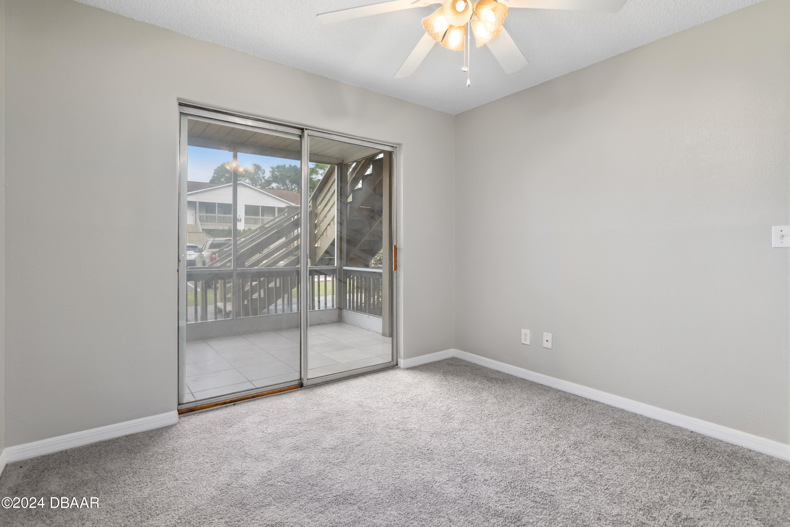 1600 Big Tree Road, Unit K1 South Daytona, FL 32119 - Photo 17 of 28 a view of an empty room with a window