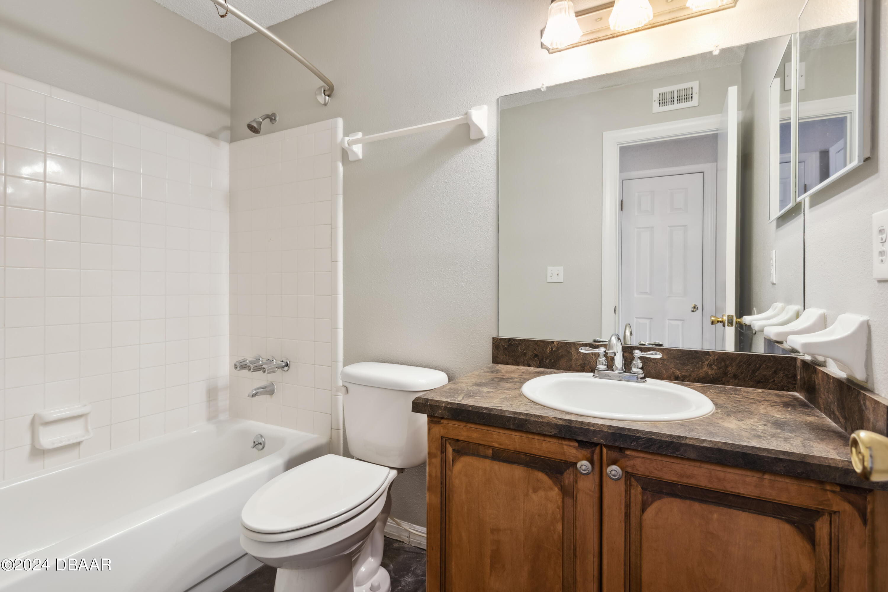 1600 Big Tree Road, Unit K1 South Daytona, FL 32119 - Photo 19 of 28 a bathroom with a sink toilet tub and shower