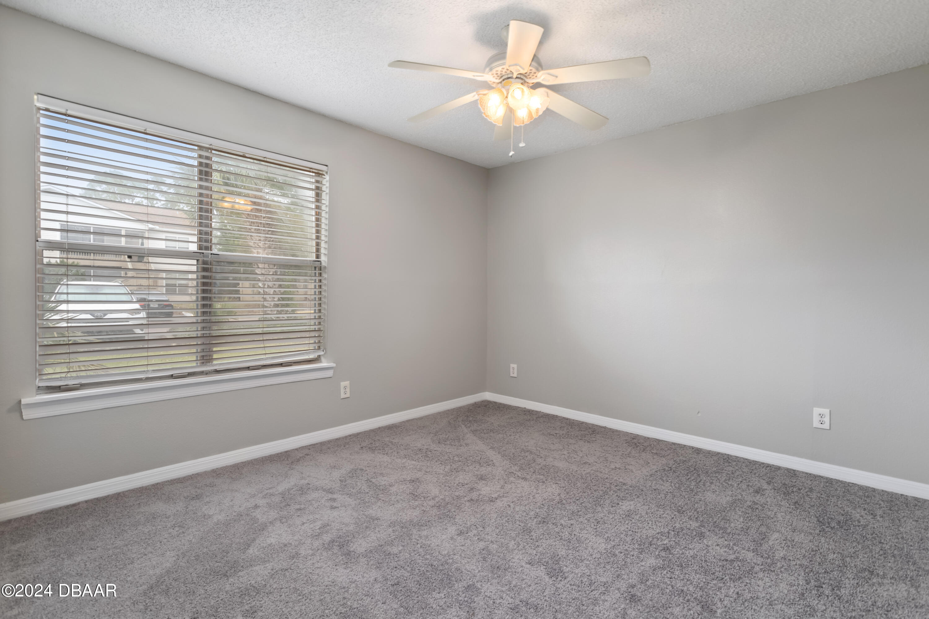 1600 Big Tree Road, Unit K1 South Daytona, FL 32119 - Photo 24 of 28 a view of an empty room with a window