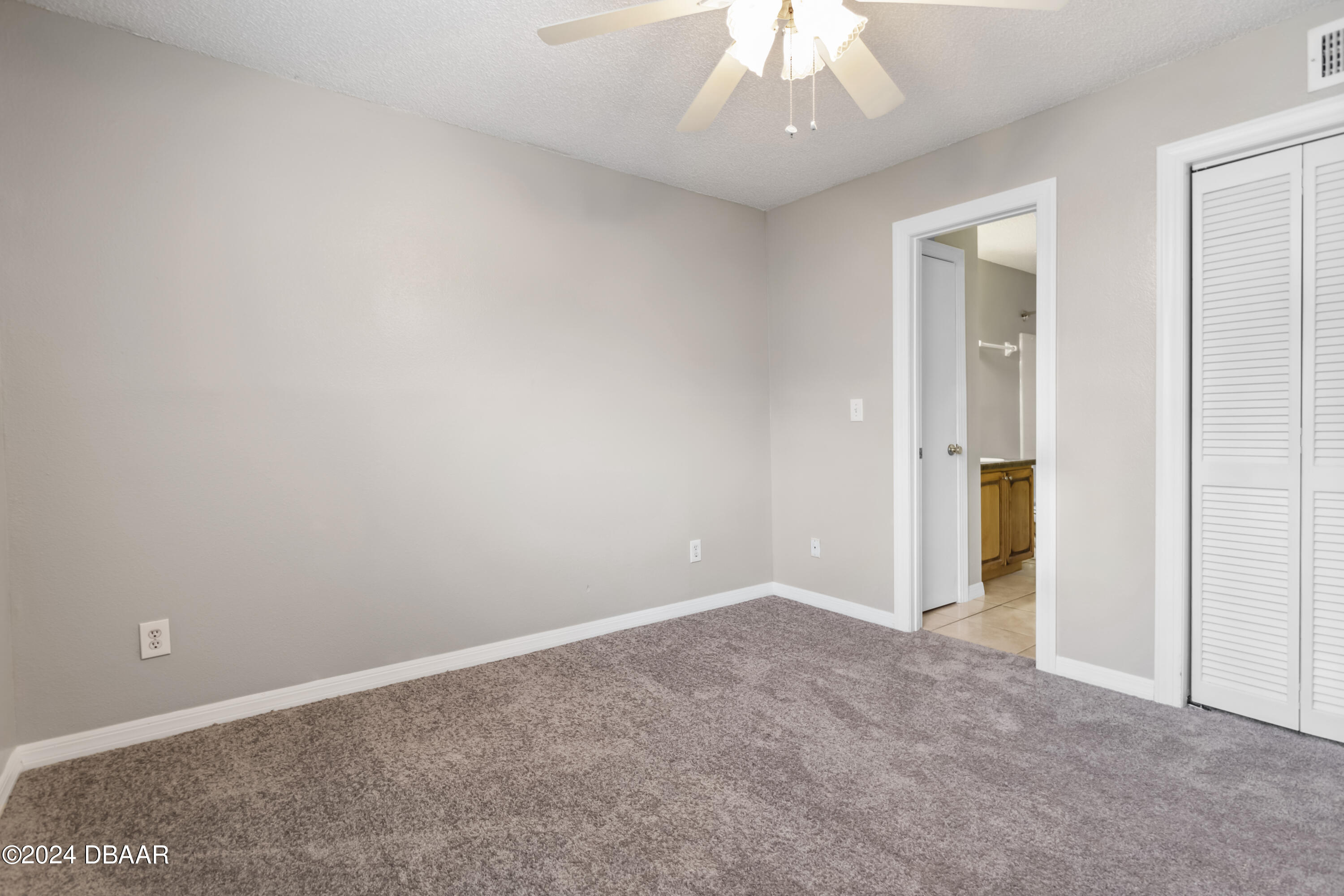 1600 Big Tree Road, Unit K1 South Daytona, FL 32119 - Photo 25 of 28 an empty room with an entryway