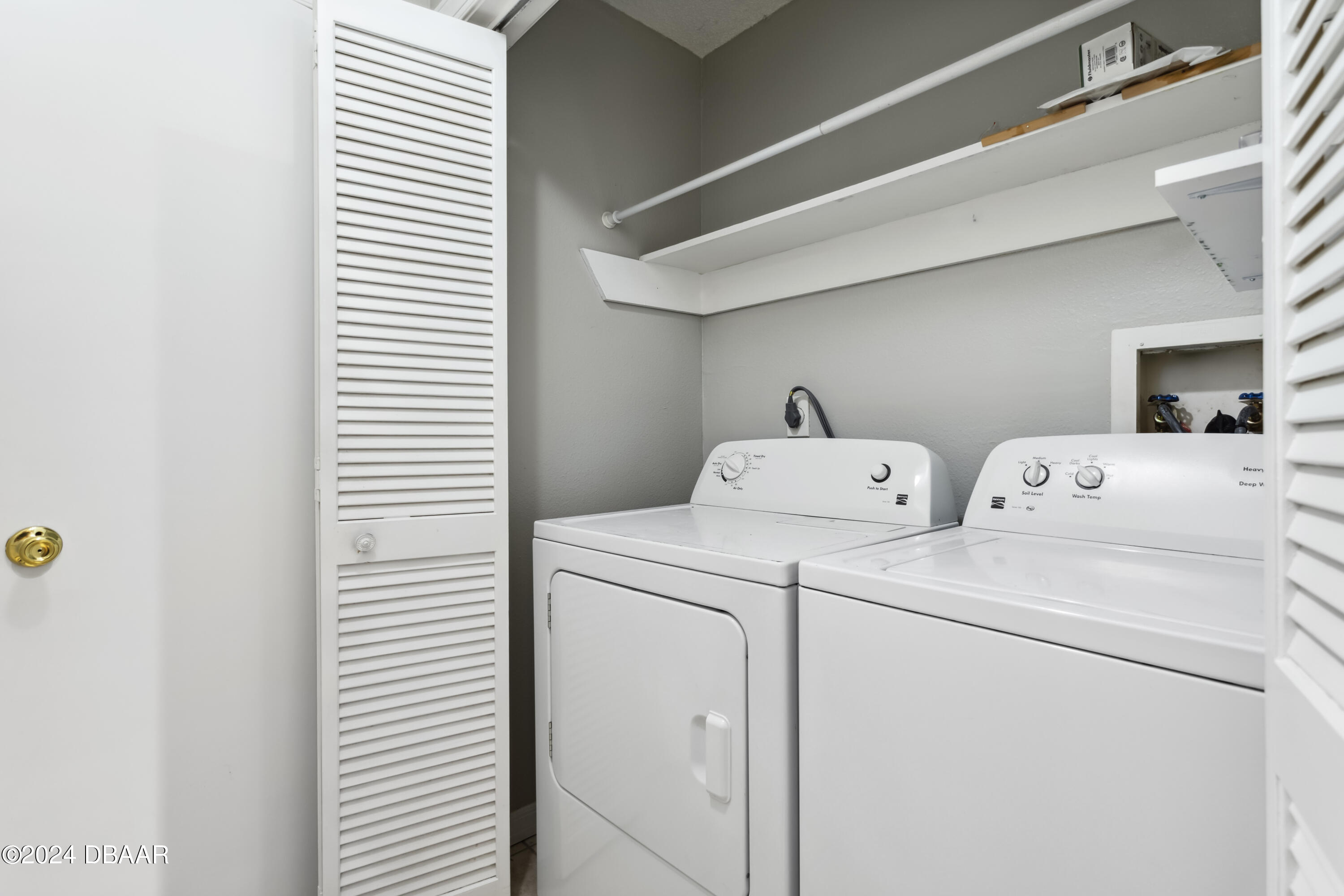 1600 Big Tree Road, Unit K1 South Daytona, FL 32119 - Photo 28 of 28 a utility room with dryer and washer