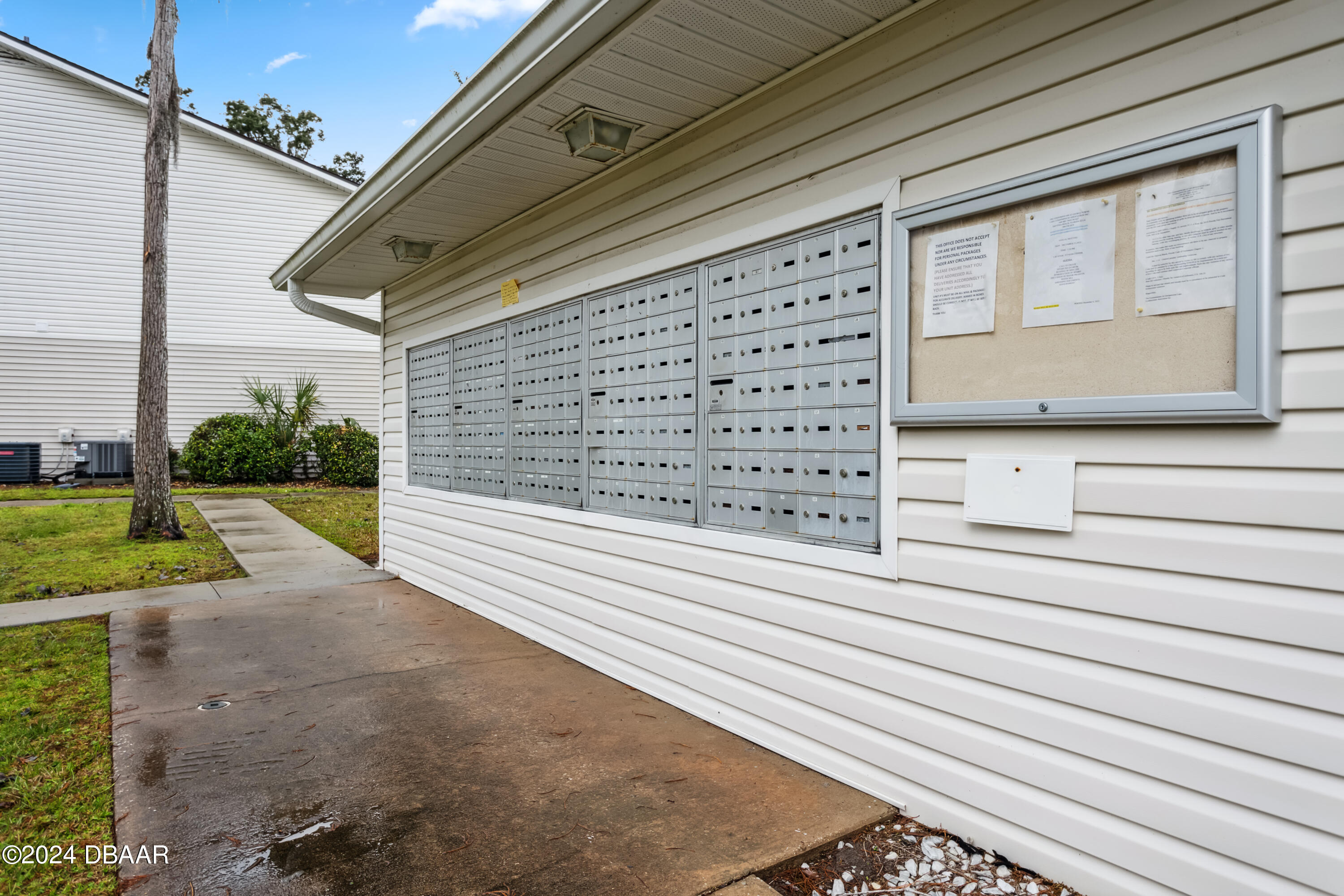 1600 Big Tree Road, Unit K1 South Daytona, FL 32119 - Photo 5 of 28 a view of a house with a yard
