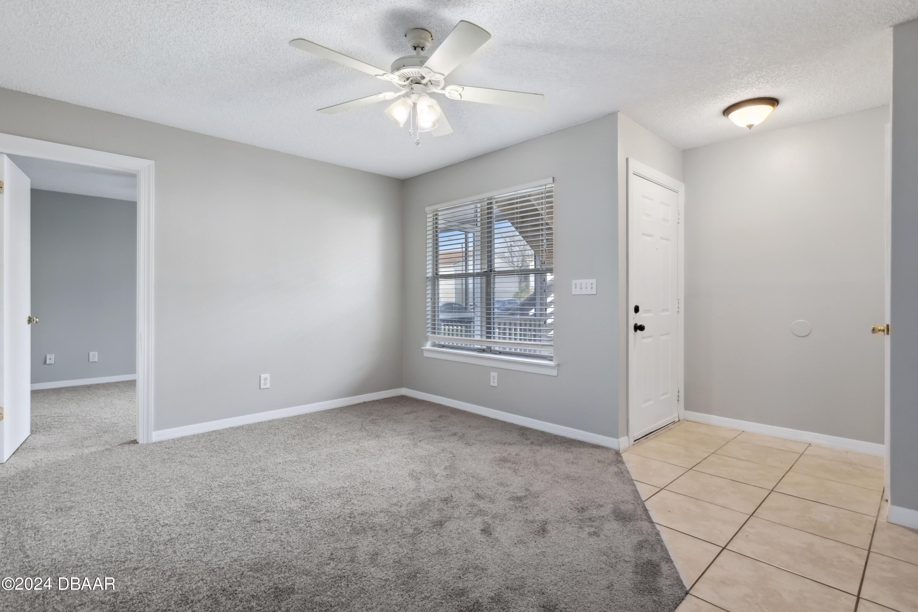 1600 Big Tree Road, Unit K1 South Daytona, FL 32119 - Photo 8 of 28 a view of an empty room with a window