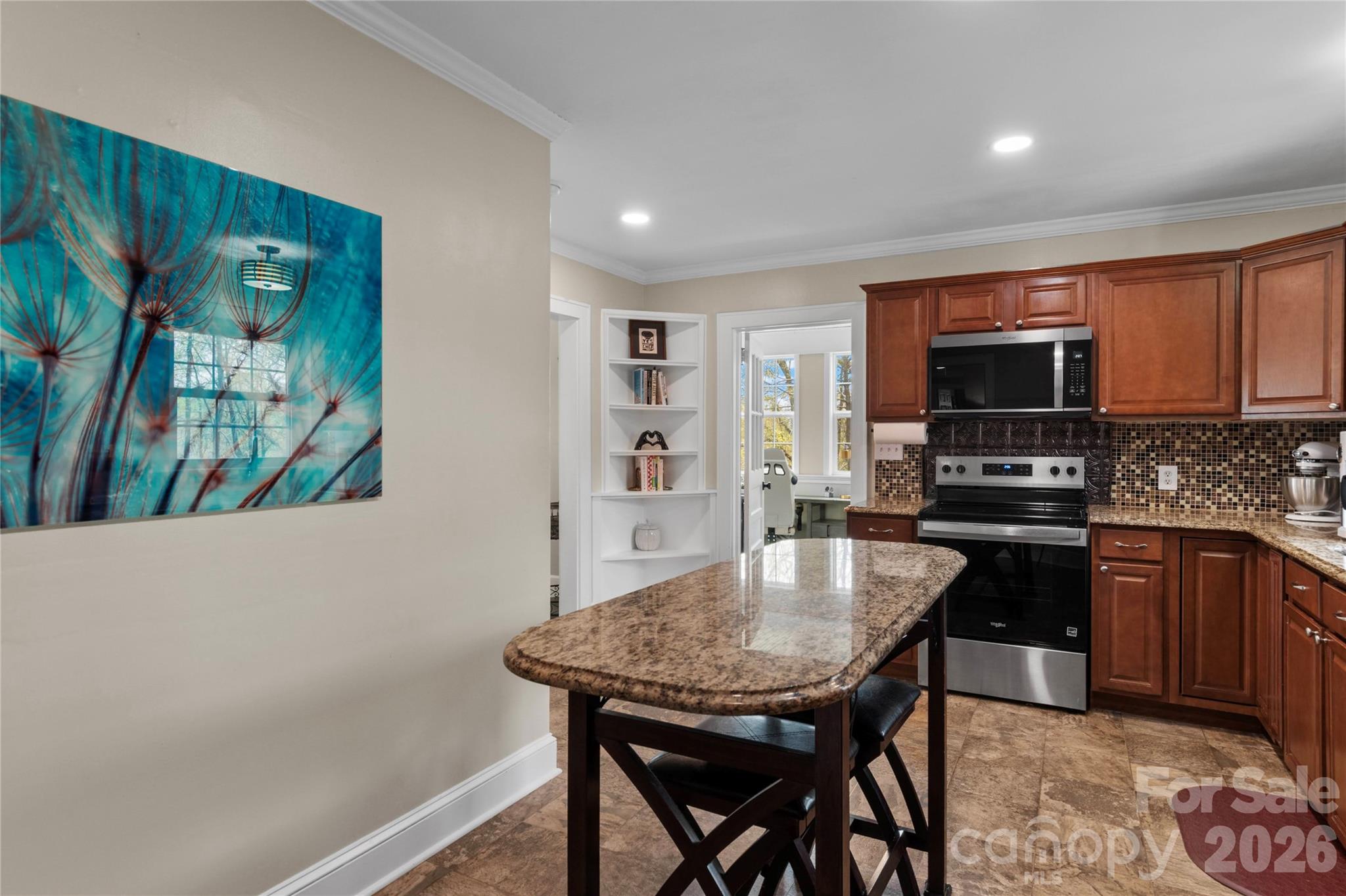 734 Oakland Drive Elkin, NC 28621 - Photo 14 of 48 a kitchen with a table and chairs in it