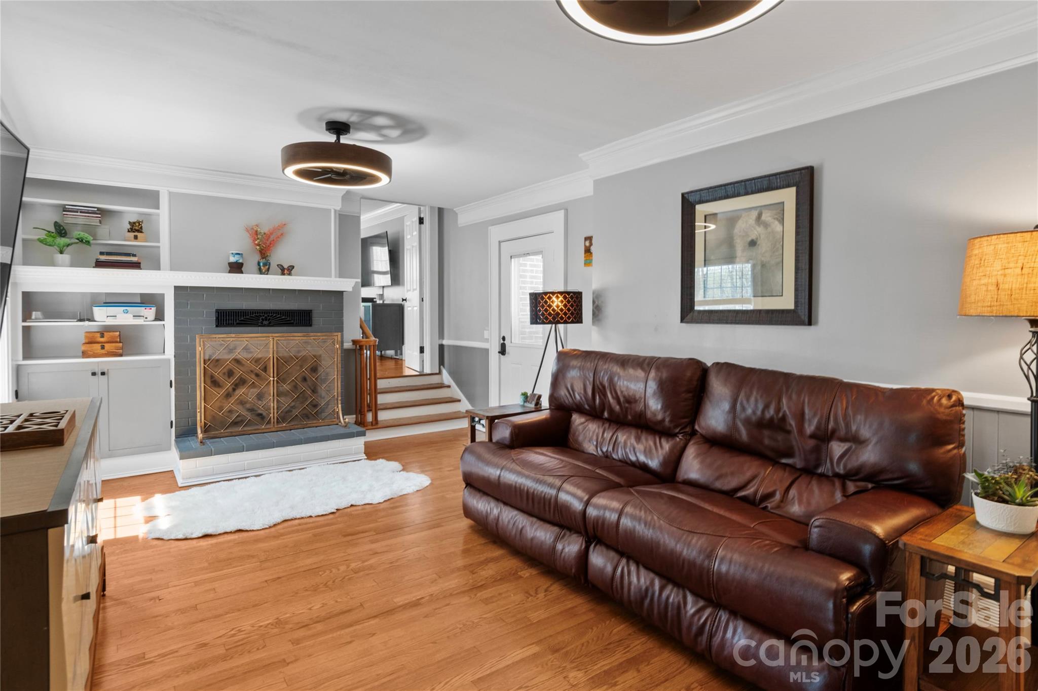 734 Oakland Drive Elkin, NC 28621 - Photo 19 of 48 a living room with furniture and a wooden floor