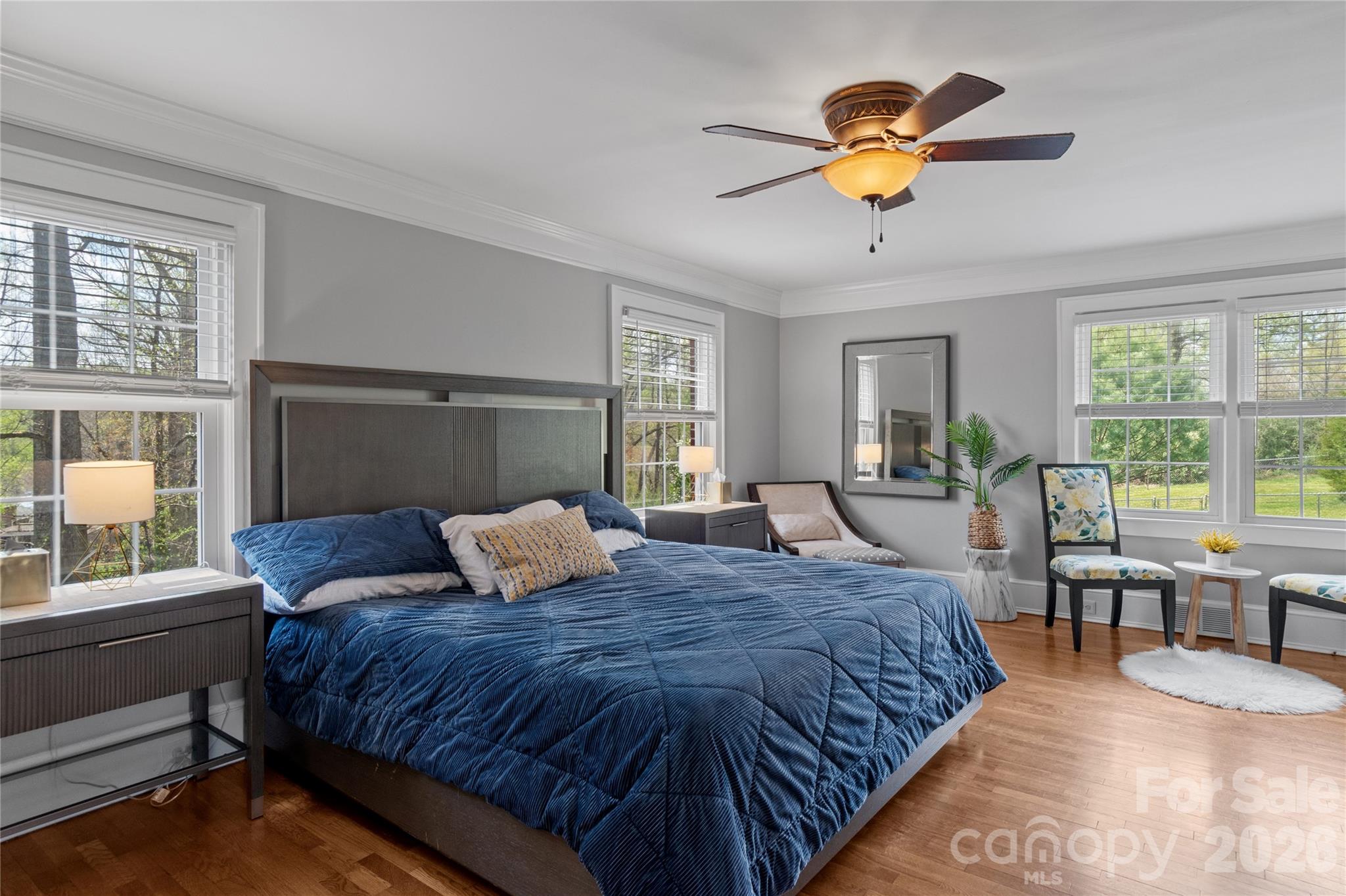 734 Oakland Drive Elkin, NC 28621 - Photo 21 of 48 a bedroom with a large bed and a large window